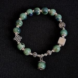 💎 3/$25 Elegant Green Jade-like Ceramic Beaded Bracelet with Silver Accents